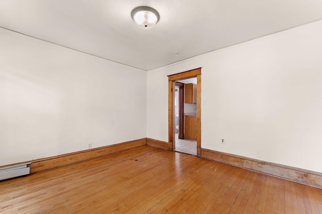 1498 Sherburne Ave, Saint Paul, MN 55104 - spare room featuring light wood-style floors and baseboards
