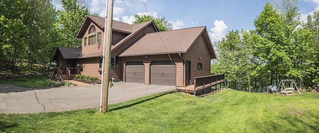 31628 Pickerel Lake Rd, Detroit Lakes, MN 56501 - view of home's exterior featuring an attached garage, a lawn, and driveway