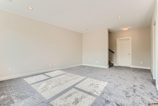 unfurnished room with carpet flooring