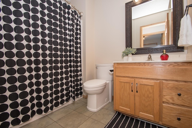 8075 211th Ave NW, Nowthen, MN 55330 - bathroom featuring vanity, tile patterned flooring, toilet, and curtained shower
