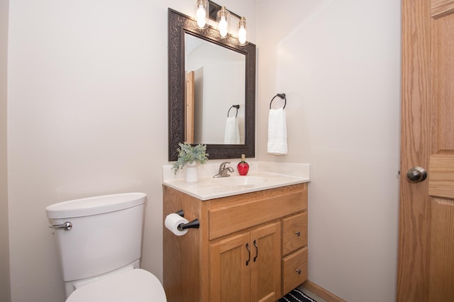8075 211th Ave NW, Nowthen, MN 55330 - bathroom featuring vanity and toilet