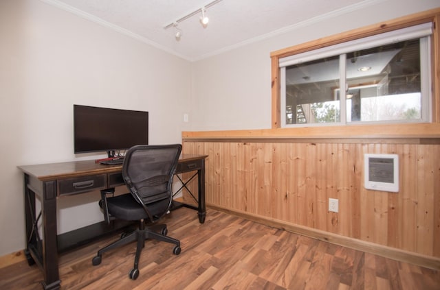 8075 211th Ave NW, Nowthen, MN 55330 - office featuring track lighting, ornamental molding, heating unit, wood finished floors, and wood walls