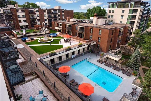 view of pool featuring a patio