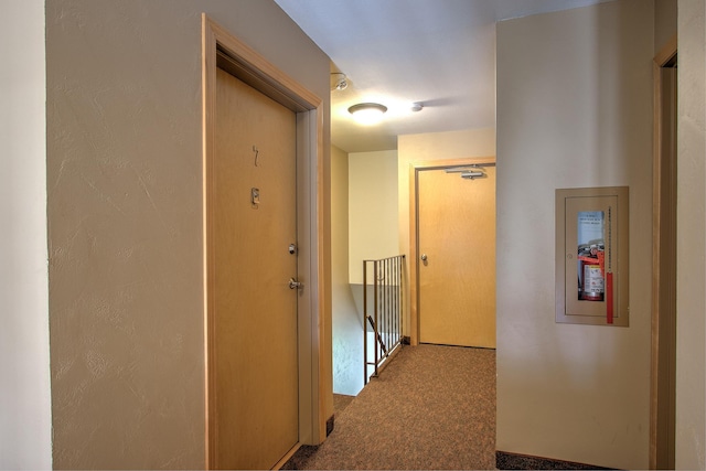 corridor featuring light carpet