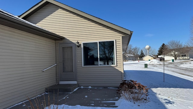 view of snow covered property