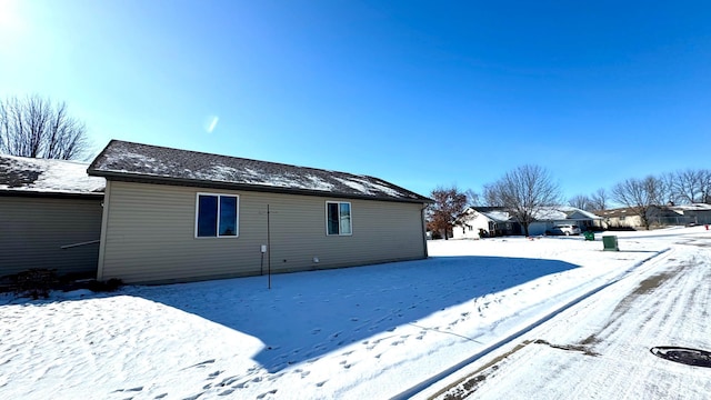 view of snow covered property