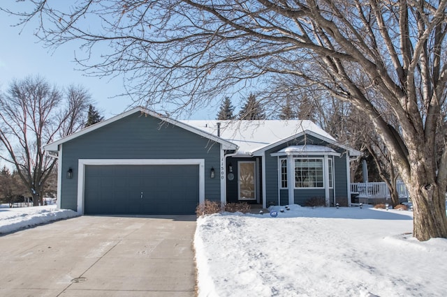 single story home featuring a garage