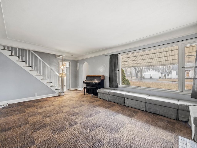 230 Mcleod Ave W, Winsted, MN 55395 - sitting room featuring carpet floors, stairs, baseboards, and arched walkways
