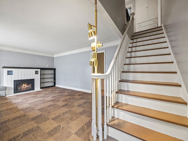 230 Mcleod Ave W, Winsted, MN 55395 - stairs with carpet, a glass covered fireplace, crown molding, and baseboards