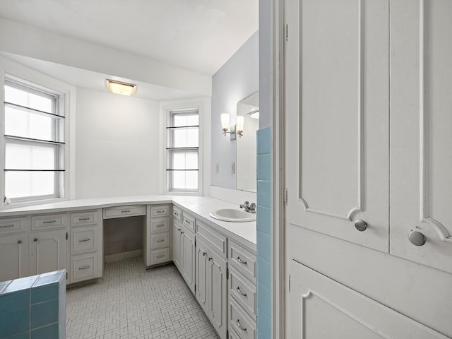 230 Mcleod Ave W, Winsted, MN 55395 - bathroom with vanity and tile patterned floors