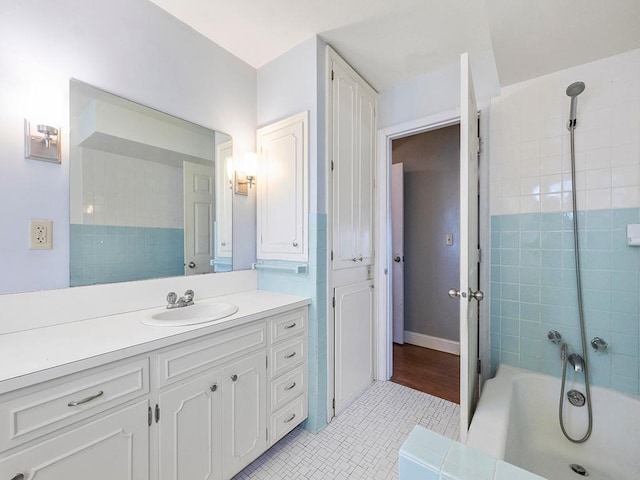 230 Mcleod Ave W, Winsted, MN 55395 - full bath with vanity, tile patterned floors, and shower / tub combination