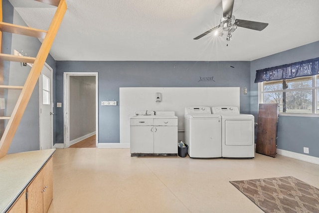 230 Mcleod Ave W, Winsted, MN 55395 - laundry room with washing machine and clothes dryer, cabinet space, a ceiling fan, baseboards, and a textured ceiling