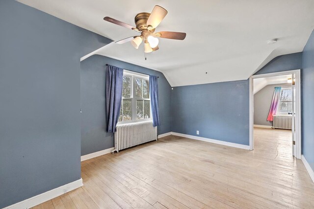 230 Mcleod Ave W, Winsted, MN 55395 - bonus room with radiator, lofted ceiling, a ceiling fan, and baseboards