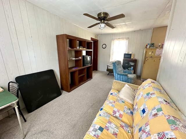 bedroom with ceiling fan and carpet