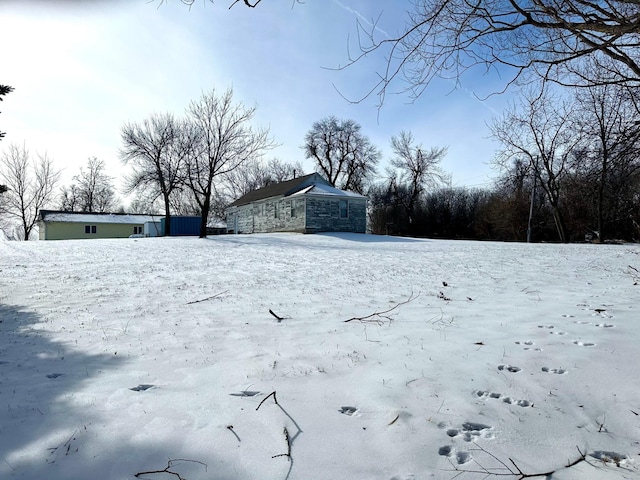view of yard covered in snow