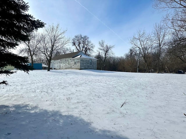view of yard covered in snow