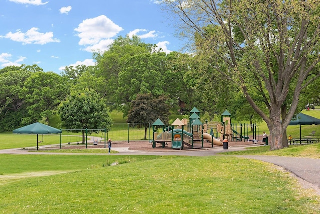 community play area featuring a lawn