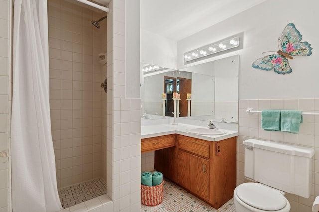 bathroom with toilet, tile patterned flooring, a tile shower, and tile walls