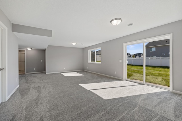 empty room with carpet flooring