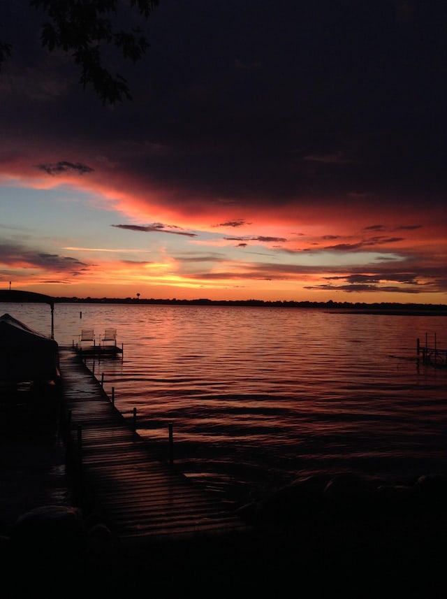 property view of water with a dock