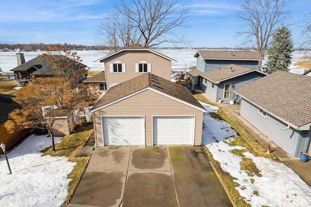 view of front of house featuring a detached garage