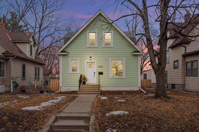 view of front of home with fence