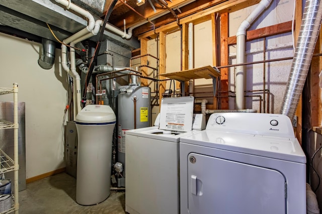 washroom with independent washer and dryer and gas water heater