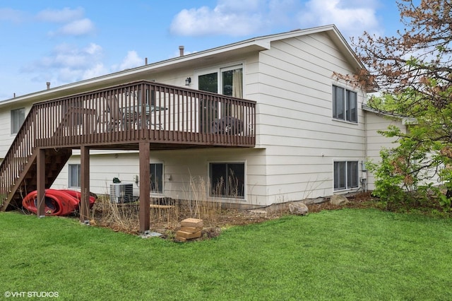 2528 Birchview Ln, Minnetonka, MN 55305 - back of property with central AC, a yard, and a wooden deck