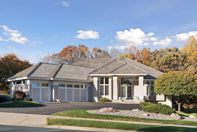 view of front of property featuring a garage