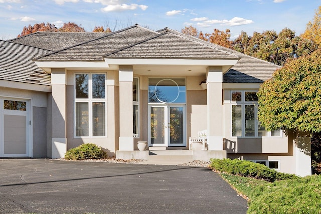 doorway to property featuring french doors