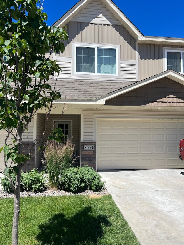 view of front of property featuring a garage