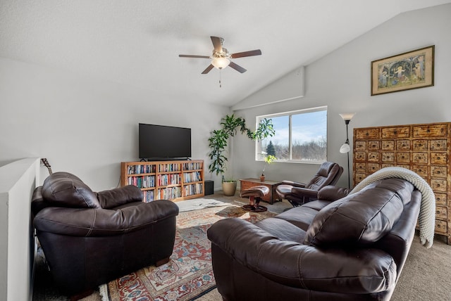 living room featuring a ceiling fan, carpet, and vaulted ceiling