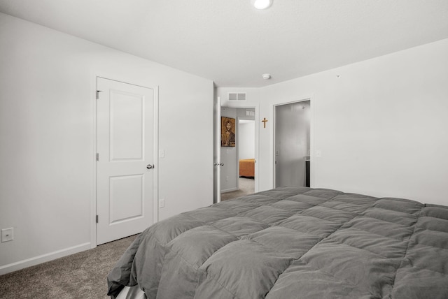 bedroom with carpet, visible vents, and baseboards