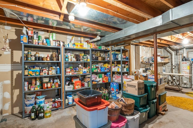 storage room featuring water heater