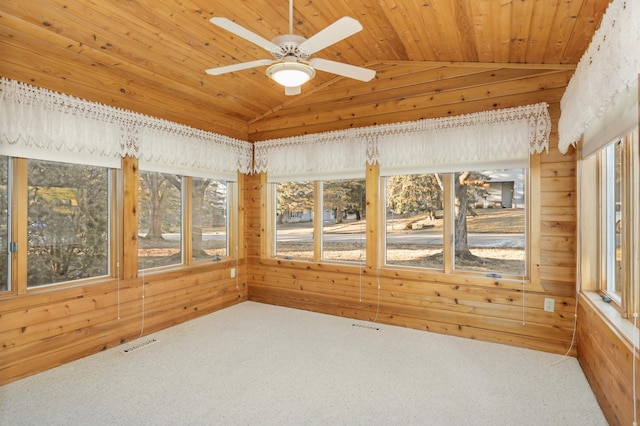 unfurnished sunroom with wood ceiling, visible vents, vaulted ceiling, and ceiling fan