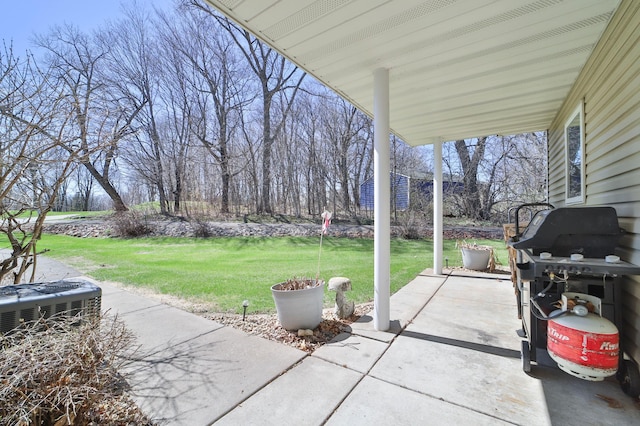 7968 Tournament Trl, Onamia, MN 56359 - view of patio / terrace featuring a grill and cooling unit