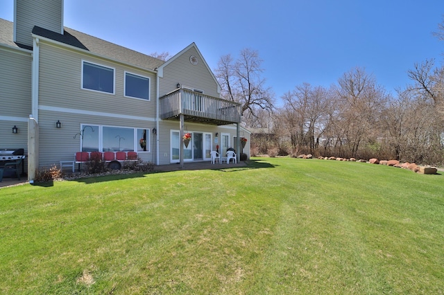 7968 Tournament Trl, Onamia, MN 56359 - rear view of property with a lawn and roof with shingles