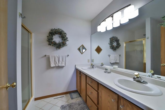 7968 Tournament Trl, Onamia, MN 56359 - bathroom with visible vents, a sink, tile patterned flooring, and a stall shower