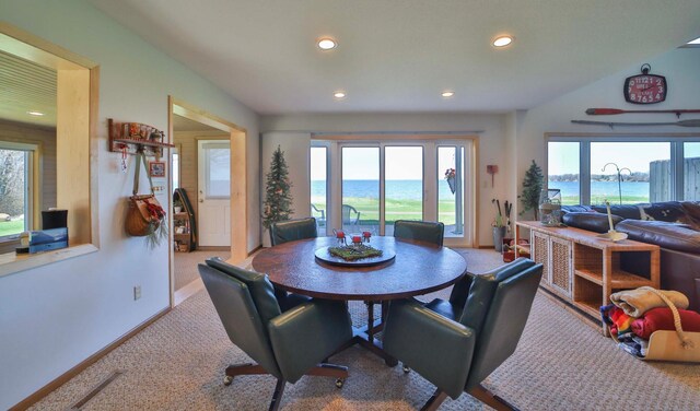 7968 Tournament Trl, Onamia, MN 56359 - dining room with carpet floors, recessed lighting, baseboards, and a water view