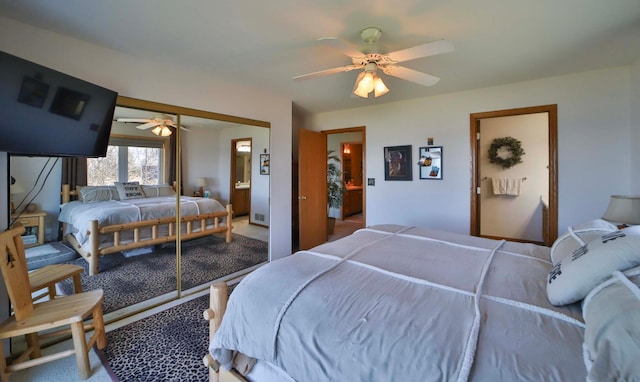 7968 Tournament Trl, Onamia, MN 56359 - carpeted bedroom with ceiling fan, visible vents, and a closet