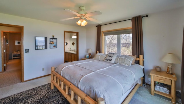 7968 Tournament Trl, Onamia, MN 56359 - carpeted bedroom with baseboards and ceiling fan