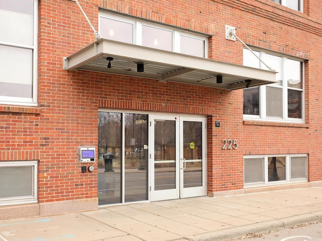 225 9th St E Unit 503, Saint Paul, MN 55101 - doorway to property with brick siding