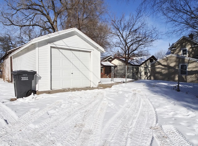 view of snow covered garage