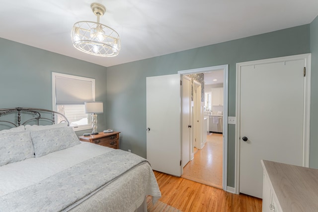 bedroom with light hardwood / wood-style floors