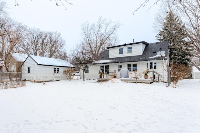 view of snow covered house