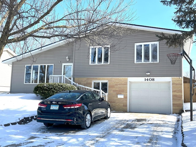 view of front of property featuring a garage