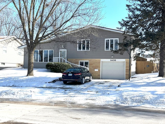 split level home with a garage