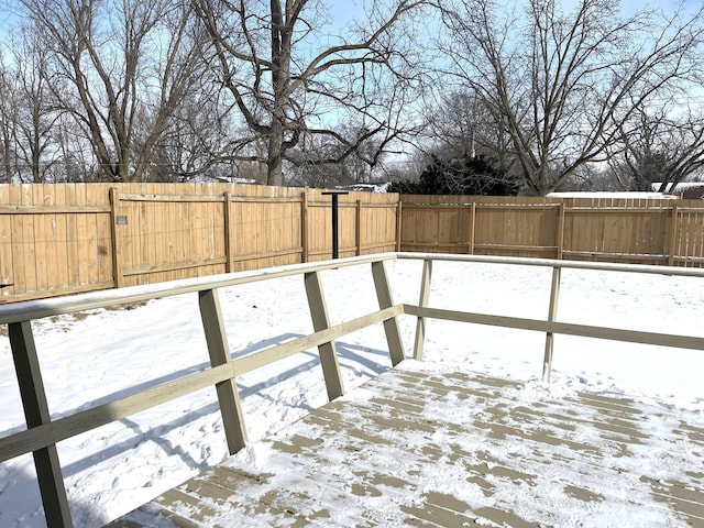 view of snow covered deck