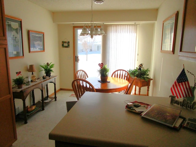 dining room featuring an inviting chandelier