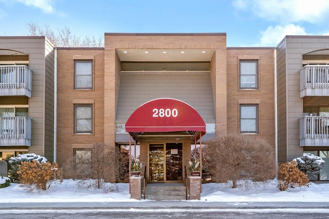 view of snow covered building